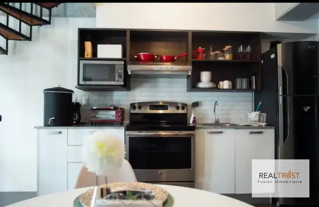 APARTAMENTO TIPO LOFT CON JARDÍN AMUEBLADO EN VENTA ZONA 10 - 8