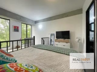 APARTAMENTO TIPO LOFT CON JARDÍN AMUEBLADO EN VENTA ZONA 10 — Apartamento en Venta en Zona 10, Guatemala, Ciudad — miniatura 2 de 11